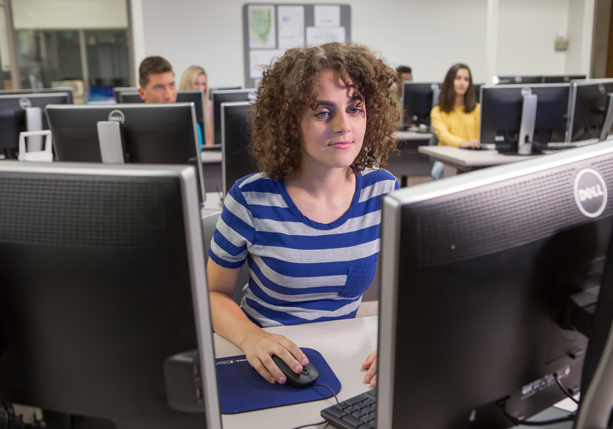 Female Student Looking at Monitor