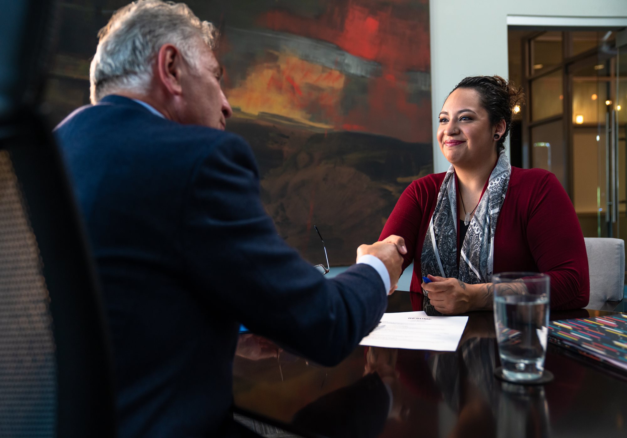 Female Insurance Producer Meeting with Male Customer