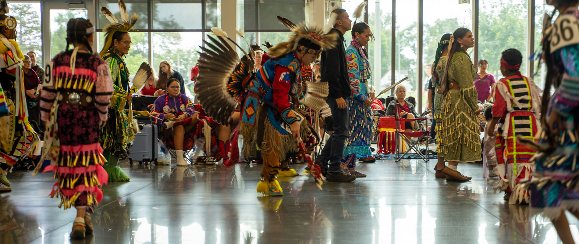 Group of Native Americans dancing at the 35th Annual Fort Omaha Intertribal Powwow