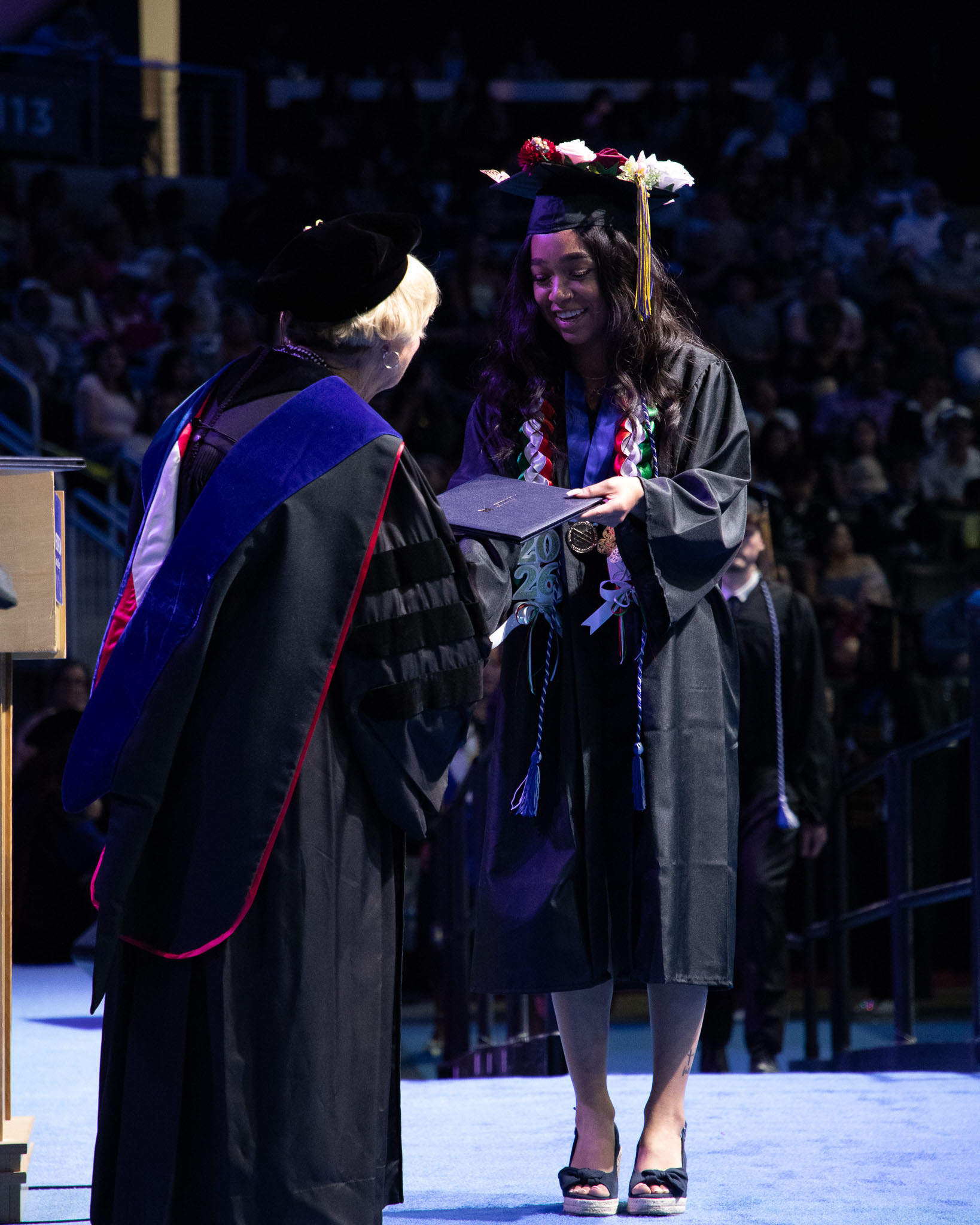 Female accepting degree on stage